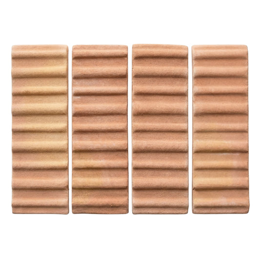 Four terracotta 3D Hatch tiles by Clay Imports with a textured, ridged surface displayed vertically.
