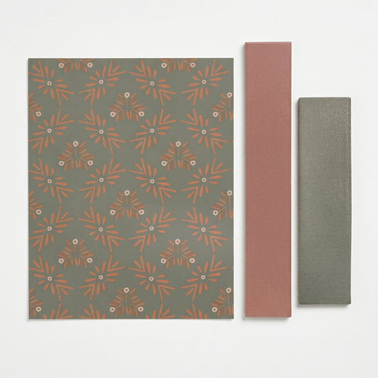 Olive Grove patterned tile sample by Clay Imports, featuring olive green with terracotta floral motifs, displayed with two coordinating solid tile samples.