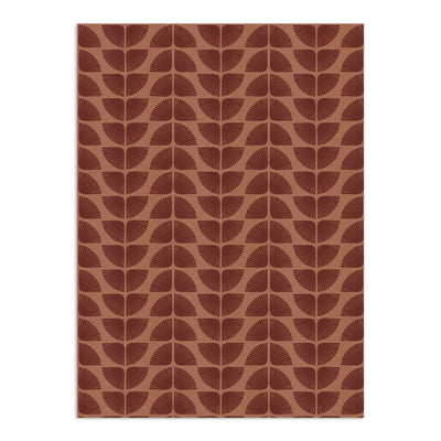 Terracotta brown wallpaper by Clay Imports featuring a repeating pattern of textured dark brown fan-shaped petals.