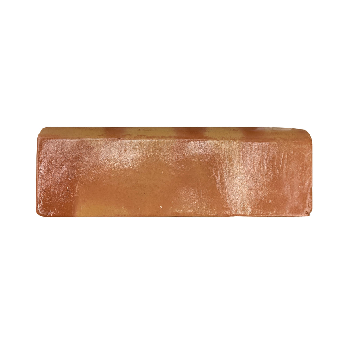 Smooth, glossy terracotta bullnose trim by Clay Imports, presented horizontally, showing its rounded edge and natural texture variation.