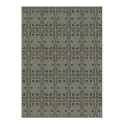 A sage green wallpaper by Clay Imports featuring repeating vertical leafy vines and abstract floral motifs.