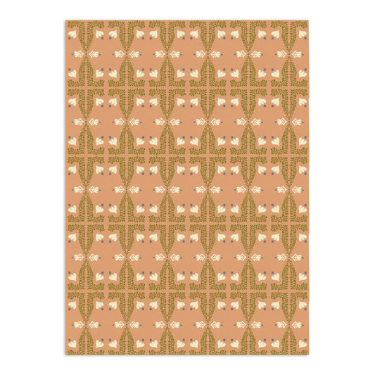 Salmon-colored wallpaper by Clay Imports with a repeating folk art pattern featuring olive green leaves, cream flowers, and blue accents.