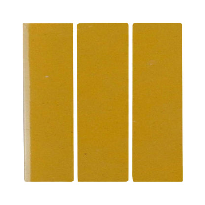 Three mustard yellow rectangular clay pieces from Clay Imports with subtle surface texture, standing upright.