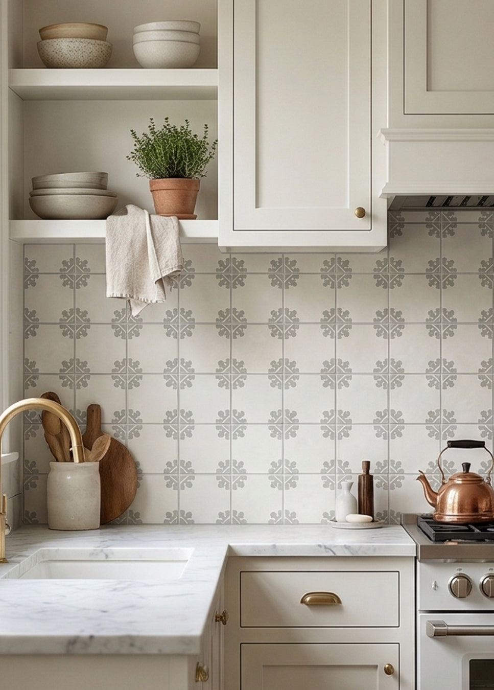 Cream Talavera tile by Clay Imports Handmade Tile, featuring a gray foliate pattern as a kitchen backsplash.