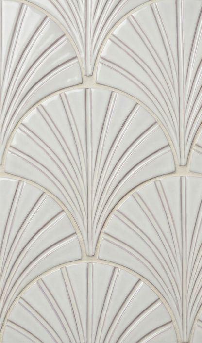 Glossy Perla Glazed Terracotta tile by Clay Imports, featuring a raised Art Deco fan pattern with light grout lines.