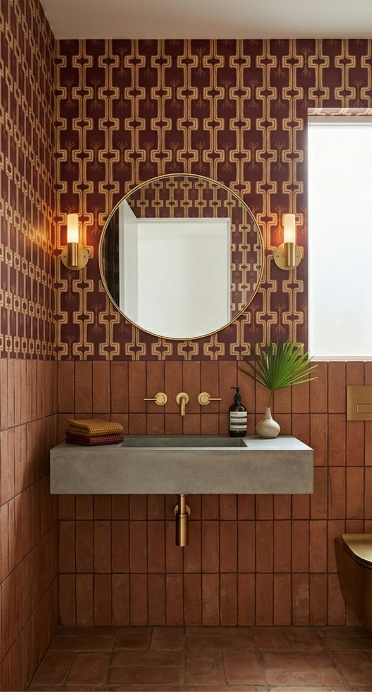 Umber Cotto 2x6 tiles by Clay Imports, reddish-brown and rectangular, installed on a bathroom wall and floor.