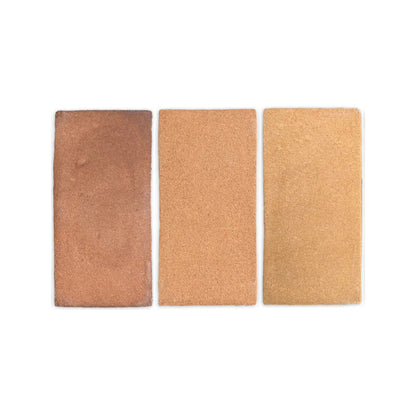 Three rectangular Ember Cotto samples from Clay Imports in varying shades, displaying a rough, granular texture.