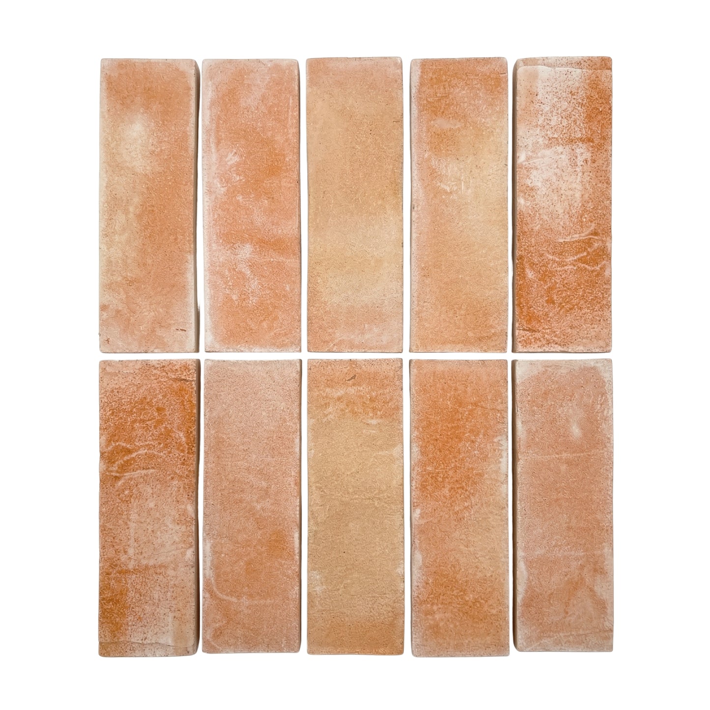 Bundle of matte terracotta tiles by Clay Imports, arranged in two rows with varied texture.
