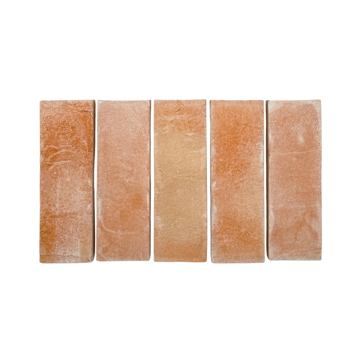 Five matte terracotta tiles by Clay Imports, arranged side-by-side, with a rough, textured surface and varying orange-brown hues.