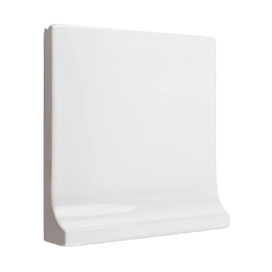 White cove base tile trim by Clay Imports with a glossy finish and a smooth curved profile.