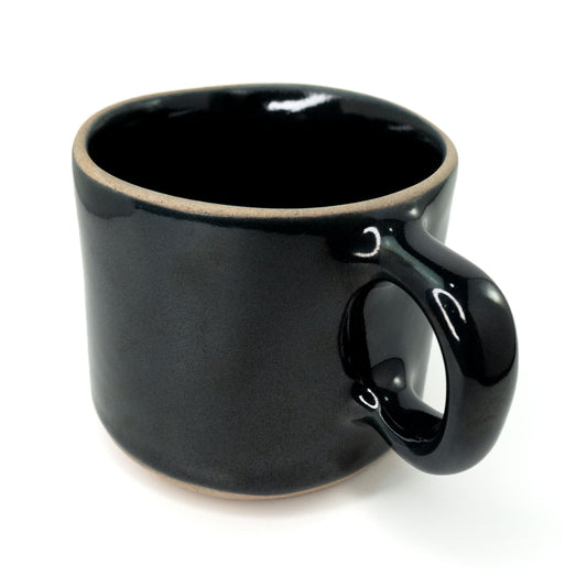 Dark grey ceramic Essential Mug by Clay Imports with a subtly speckled glaze, unglazed tan rim, and base.