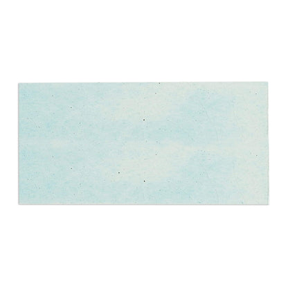 Light blue Rain Crackle Gloss Sample by Clay Imports, showing fine crackles and tiny dark flecks.