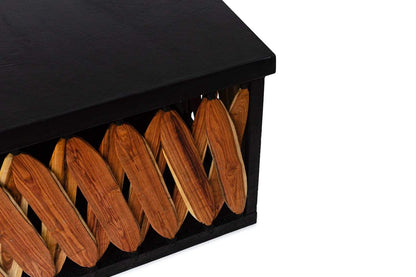 Square Box Coffee Table by Clay Imports with a black top and interwoven brown wooden slat sides, shown from a cropped angle.