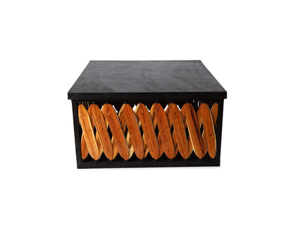 Black square box coffee table by Clay Imports with natural wood slatted sides, front view.