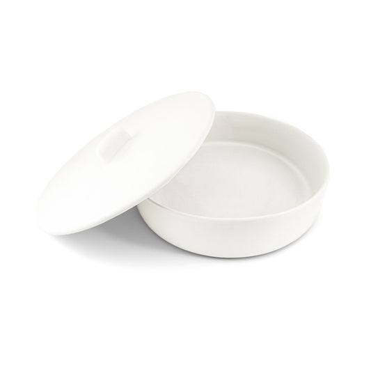 White round clay tortillero by Clay Imports, with its lid slightly ajar and a small handle.